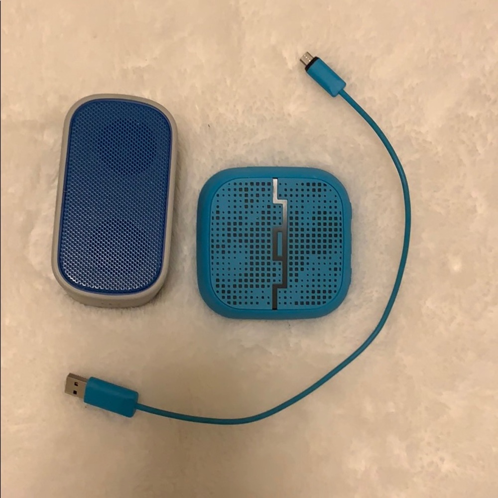 Two Bluetooth speakers w/ charging cable included